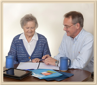 Real Estate Agent Working with Senior to Plan Moving